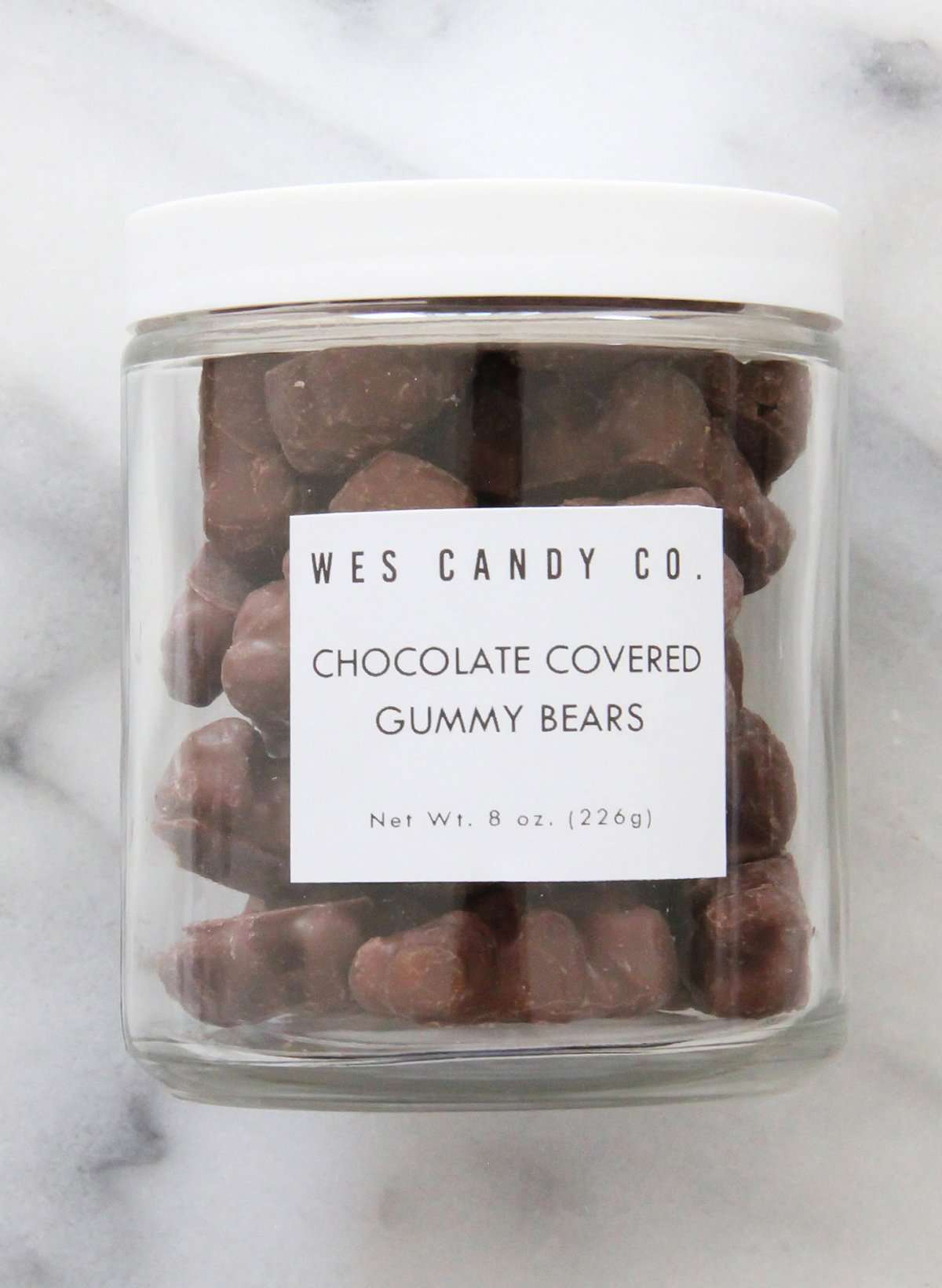 8oz jar assorted chocolate covered gummy bears. Approximately 6 servings.