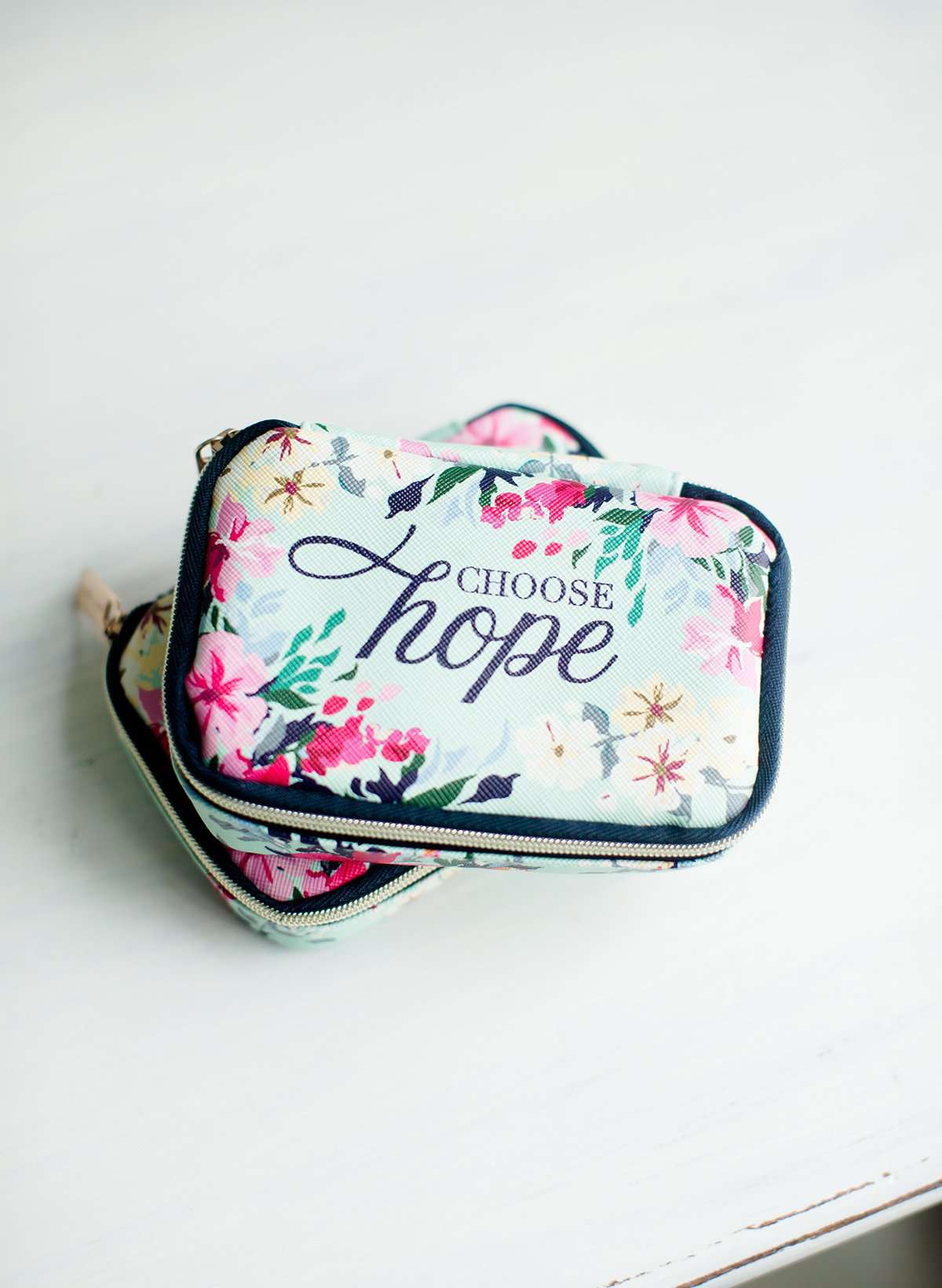Floral pill case with a Christian quote on the cover saying Choose Hope.