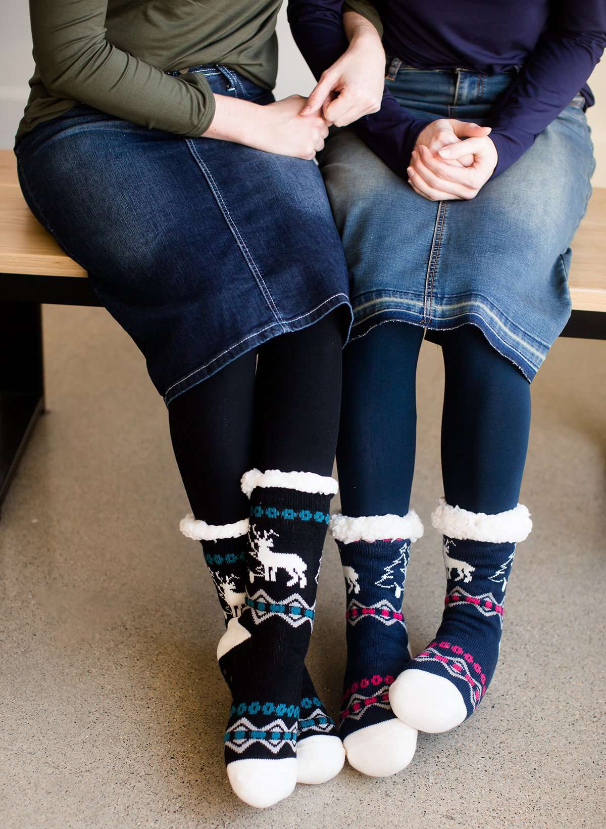 Reindeer and Pine Tree Christmas scene slipper socks in gray, navy and black.