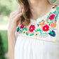 This is a modest ruffle sleeve green, red, blue embroidered top