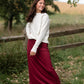Clarise Burgundy Premium Knit Maxi Skirt is and inherit design that is a maxi knit skirt and is fully lined.