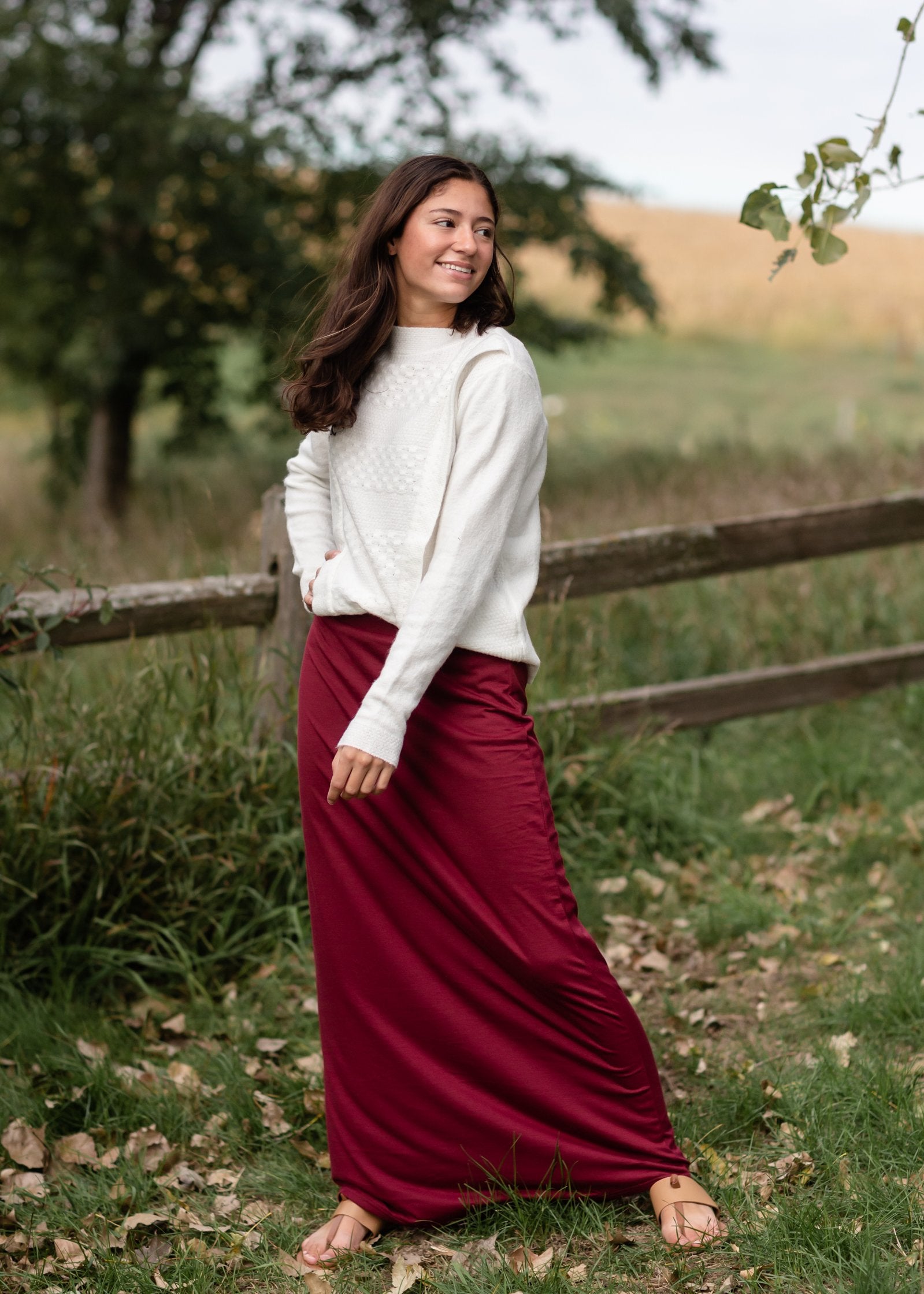 Clarise Burgundy Premium Knit Maxi Skirt is and inherit design that is a maxi knit skirt and is fully lined.