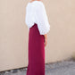 Clarise Burgundy Premium Knit Maxi Skirt is and inherit design that is a maxi knit skirt and is fully lined.