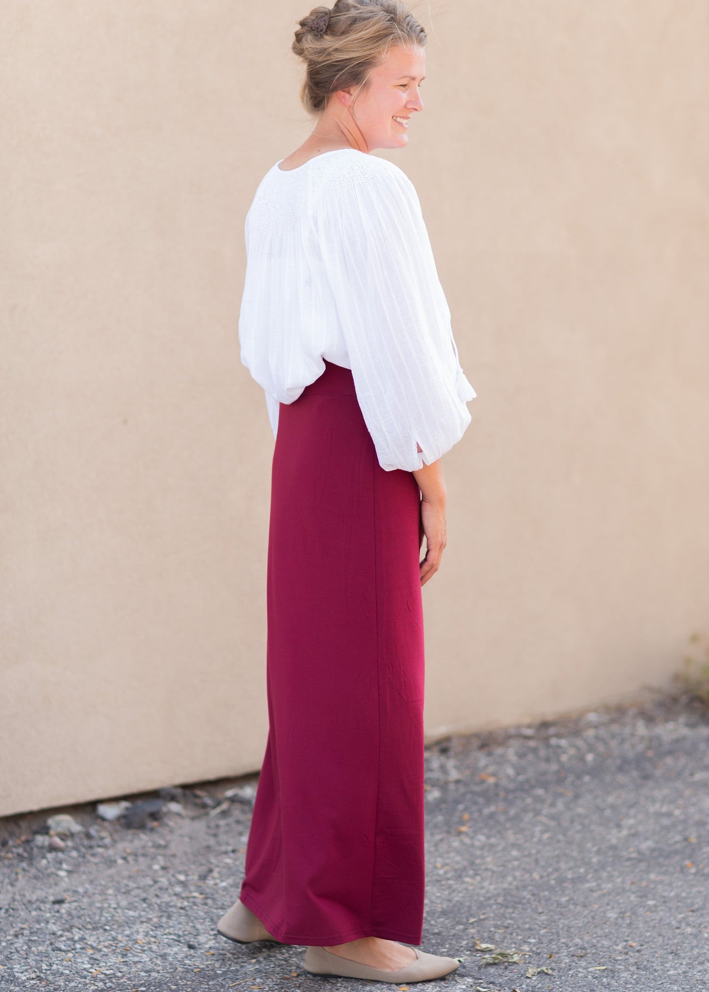 Clarise Burgundy Premium Knit Maxi Skirt is and inherit design that is a maxi knit skirt and is fully lined.