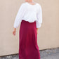 Clarise Burgundy Premium Knit Maxi Skirt is and inherit design that is a maxi knit skirt and is fully lined.