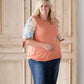 cork colored plus size modest top with floral tie sleeves.