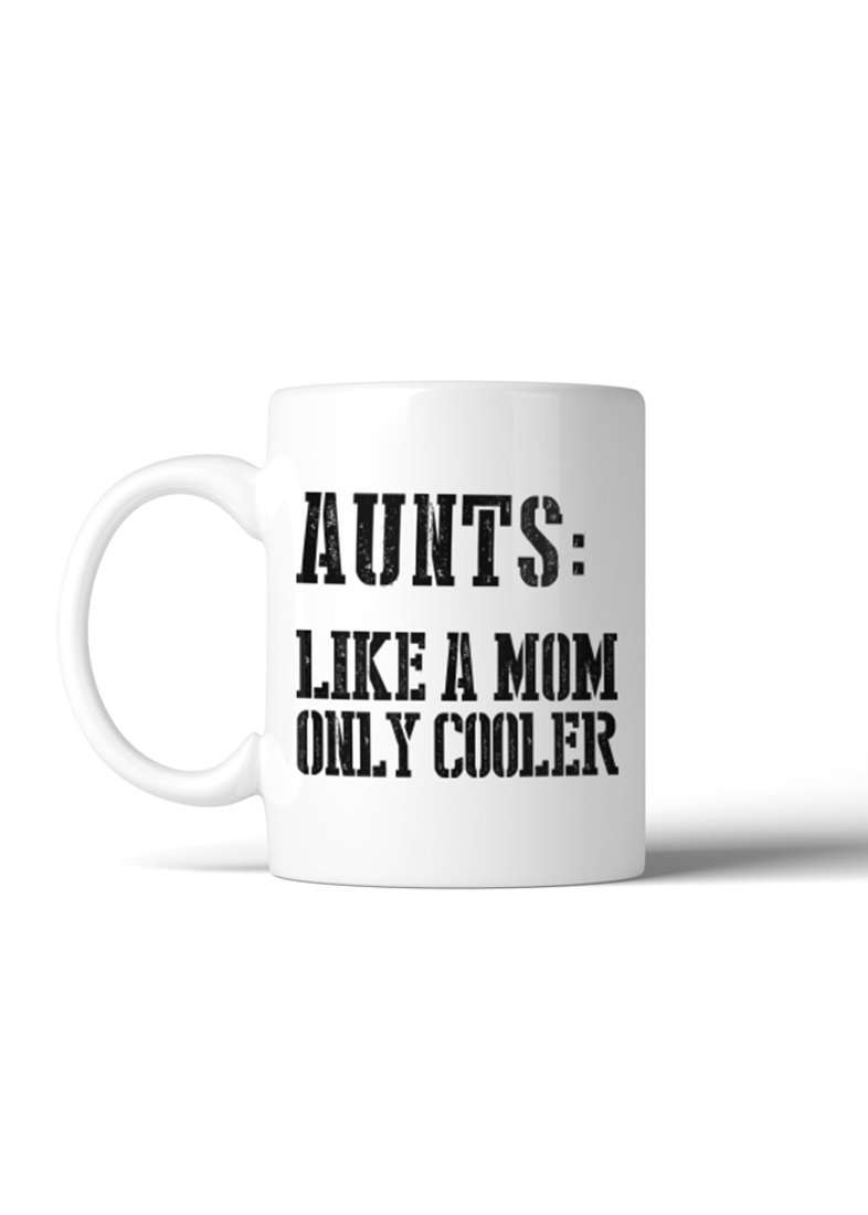 white coffee mug with "aunts: like a mom only cooler" written on it in black.