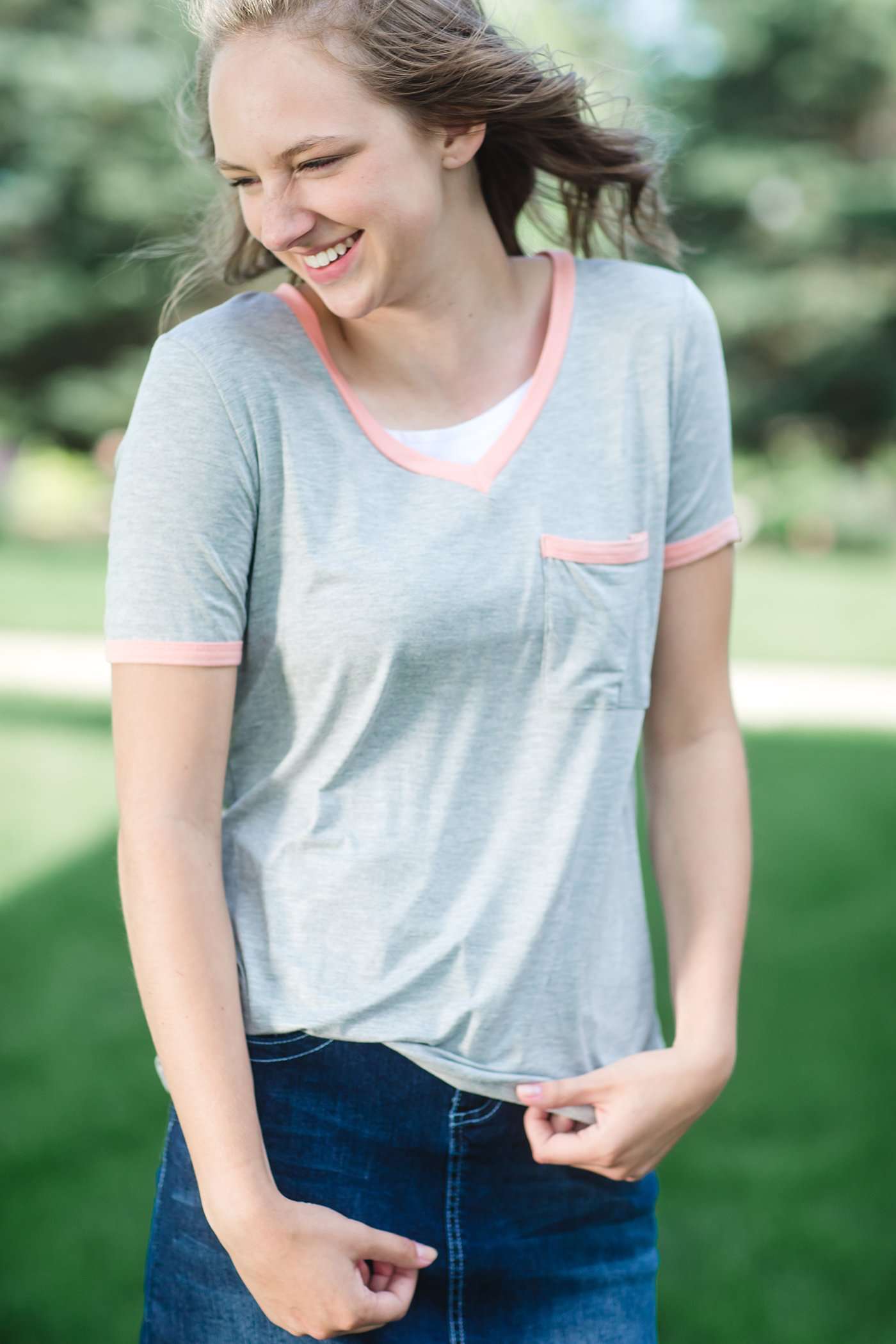 Modest grey v-neck t-shirt with coral hems.