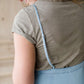 olive colored cotton rolled tee