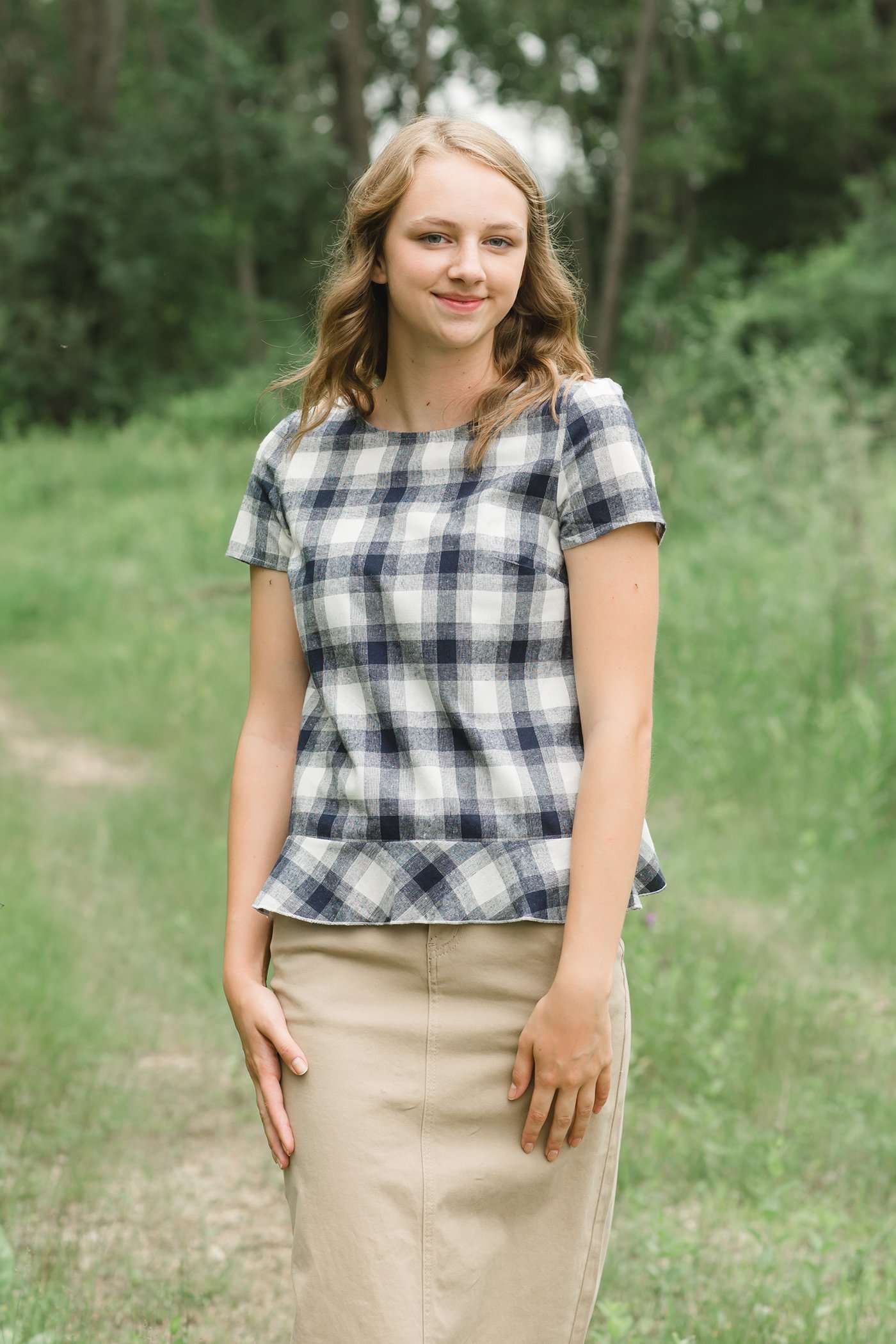 Red or Navy checked country plaid short sleeve top with ruffle back and bottom..