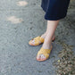 1/2 inch criss cross strap sandal in rust, navy, mauve or mustard color.