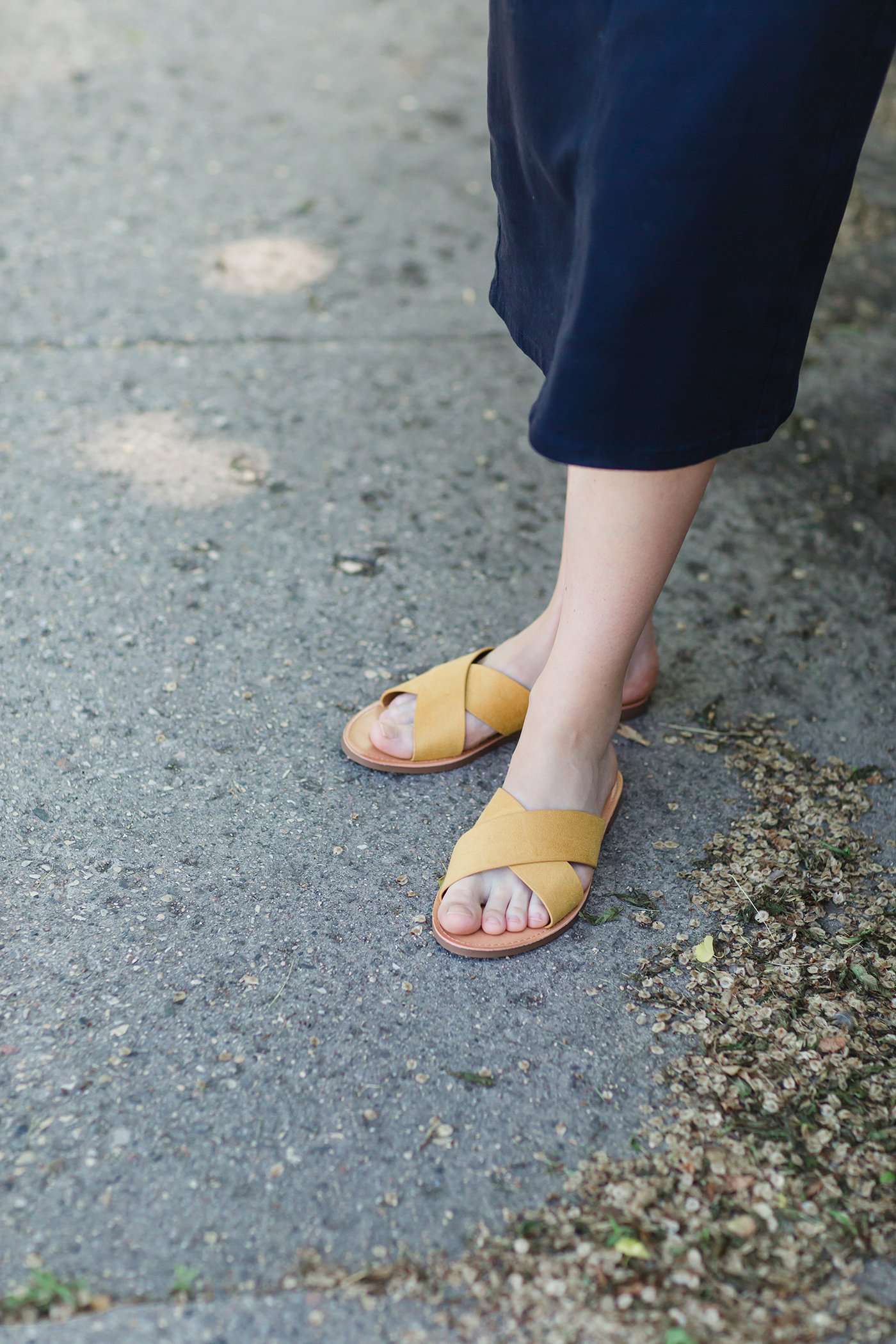 1/2 inch criss cross strap sandal in rust, navy, mauve or mustard color.