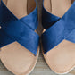 Slide on sandals with a criss cross top