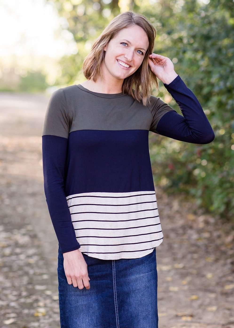 olive, navy and striped block long sleeve top with a back embroidered detail.