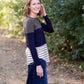 olive, navy and striped block long sleeve top with a back embroidered detail.
