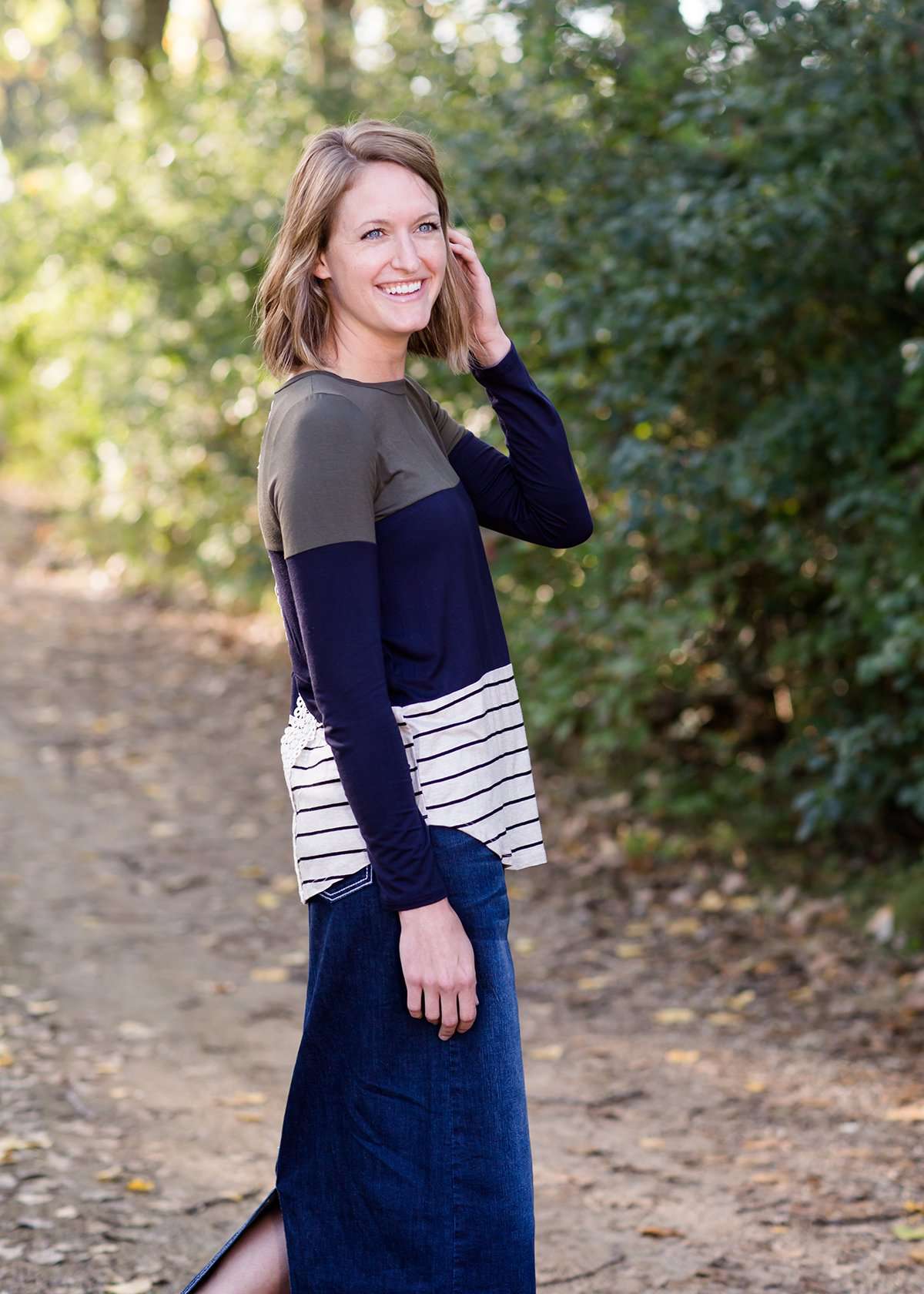 olive, navy and striped block long sleeve top with a back embroidered detail.