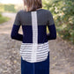 olive, navy and striped block long sleeve top with a back embroidered detail.