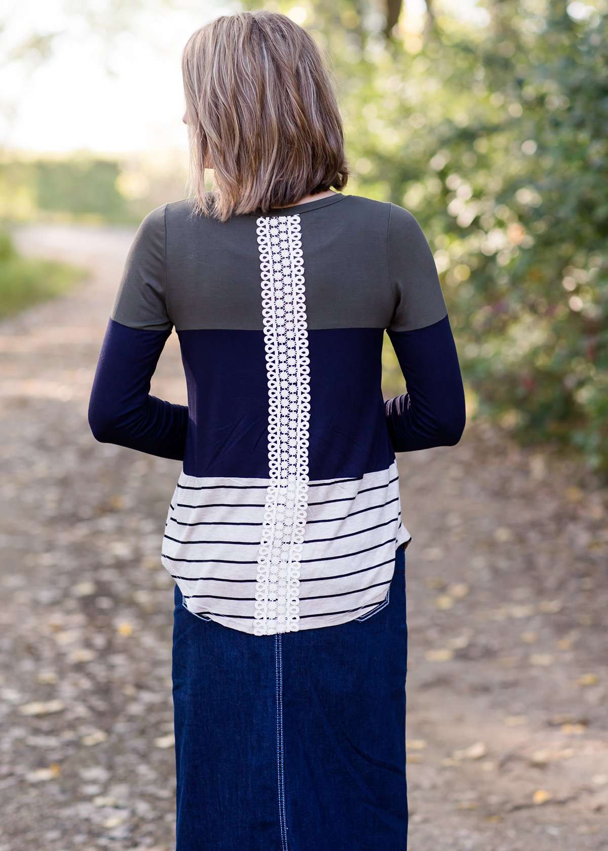 olive, navy and striped block long sleeve top with a back embroidered detail.