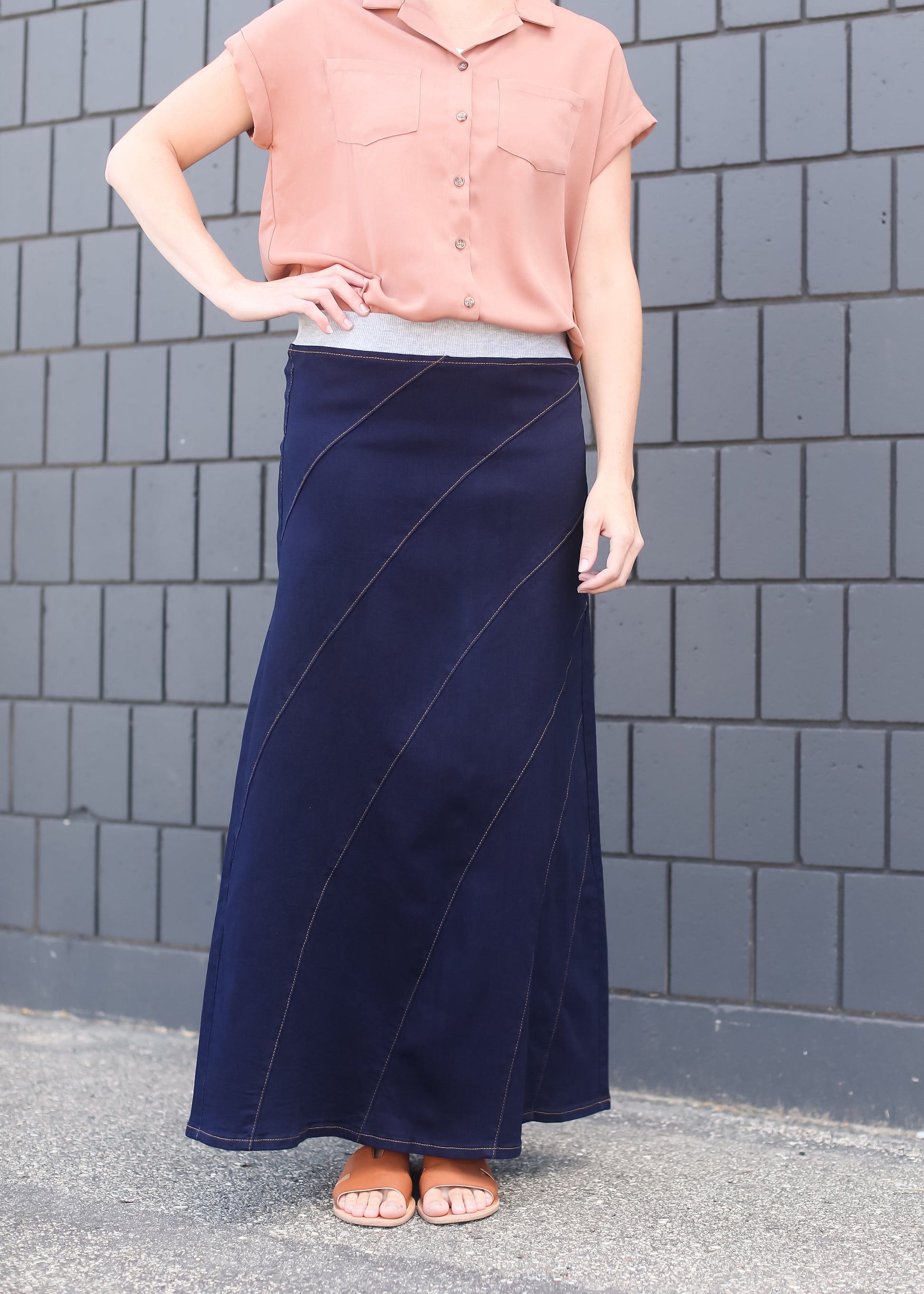 woman wearing a long aline no slit denim skirt