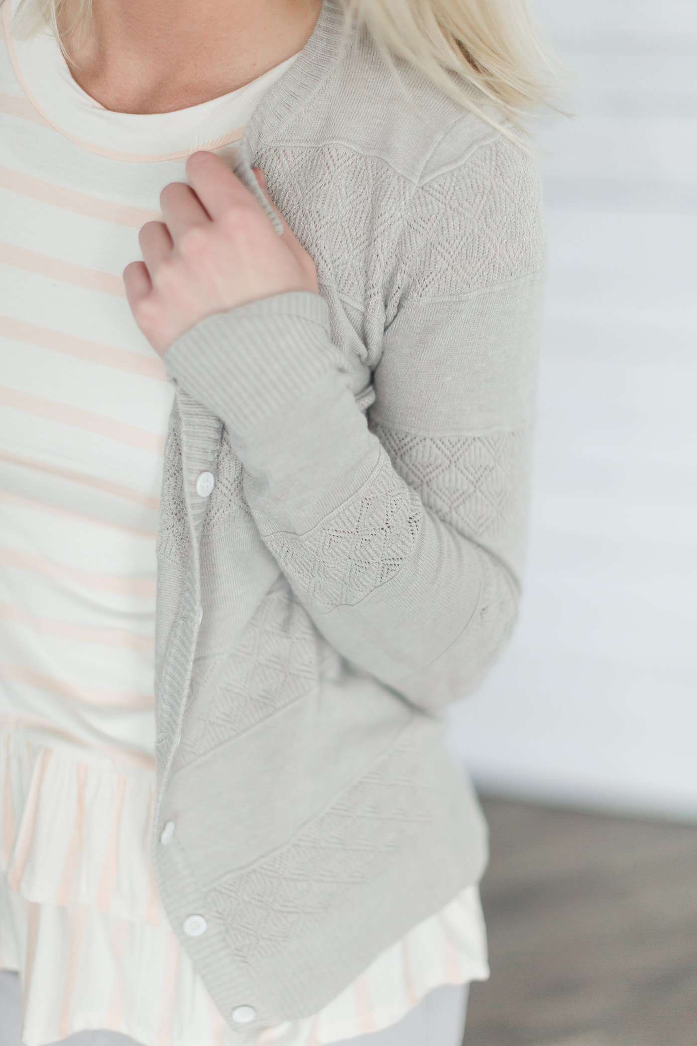 Women's button down detailed cardigan in mustard, dusty pink, ivory and gray.