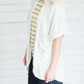 Light grey short sleeve open front cardigan.