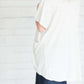 Light grey short sleeve open front cardigan.