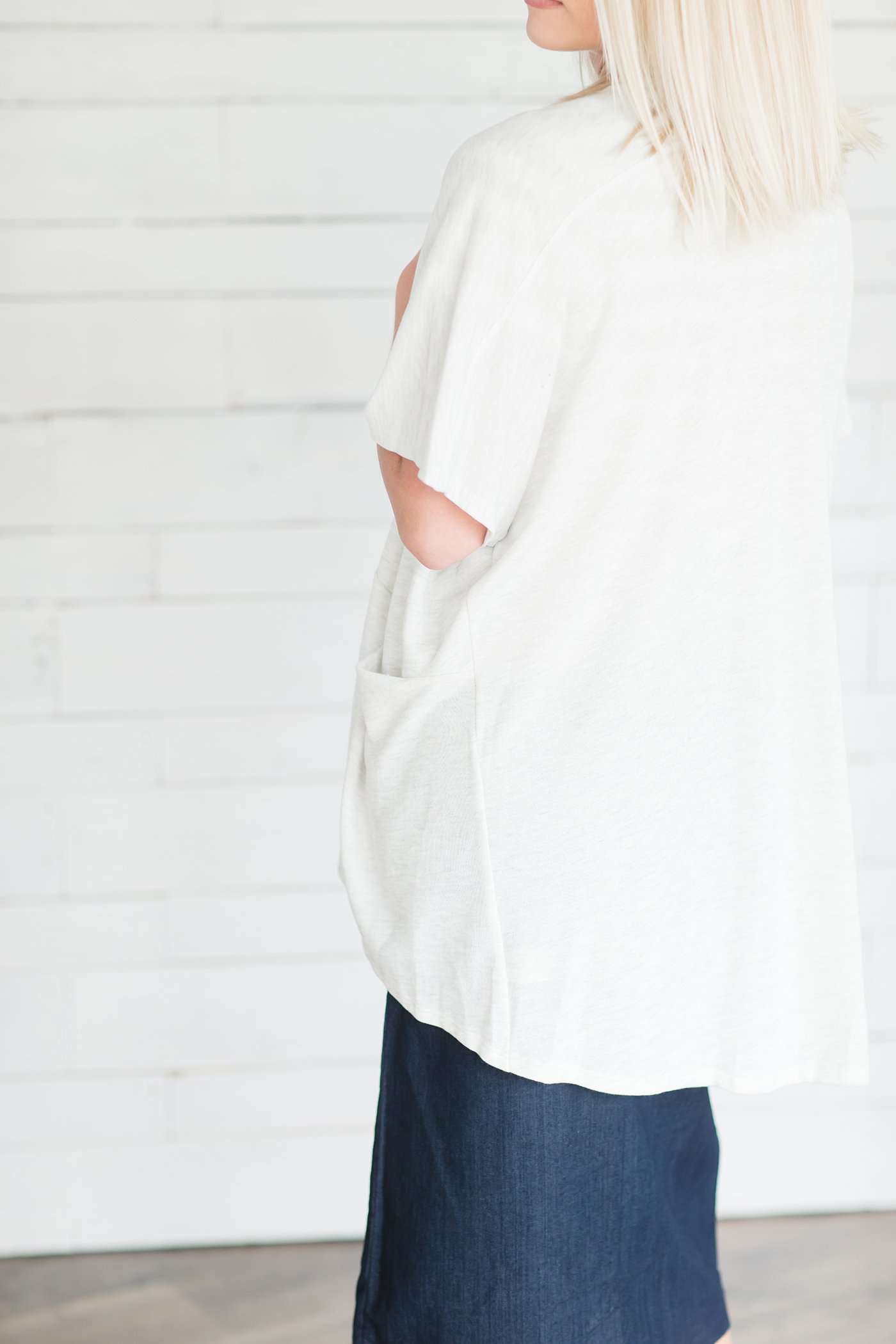 Light grey short sleeve open front cardigan.