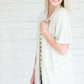 Light grey short sleeve open front cardigan.
