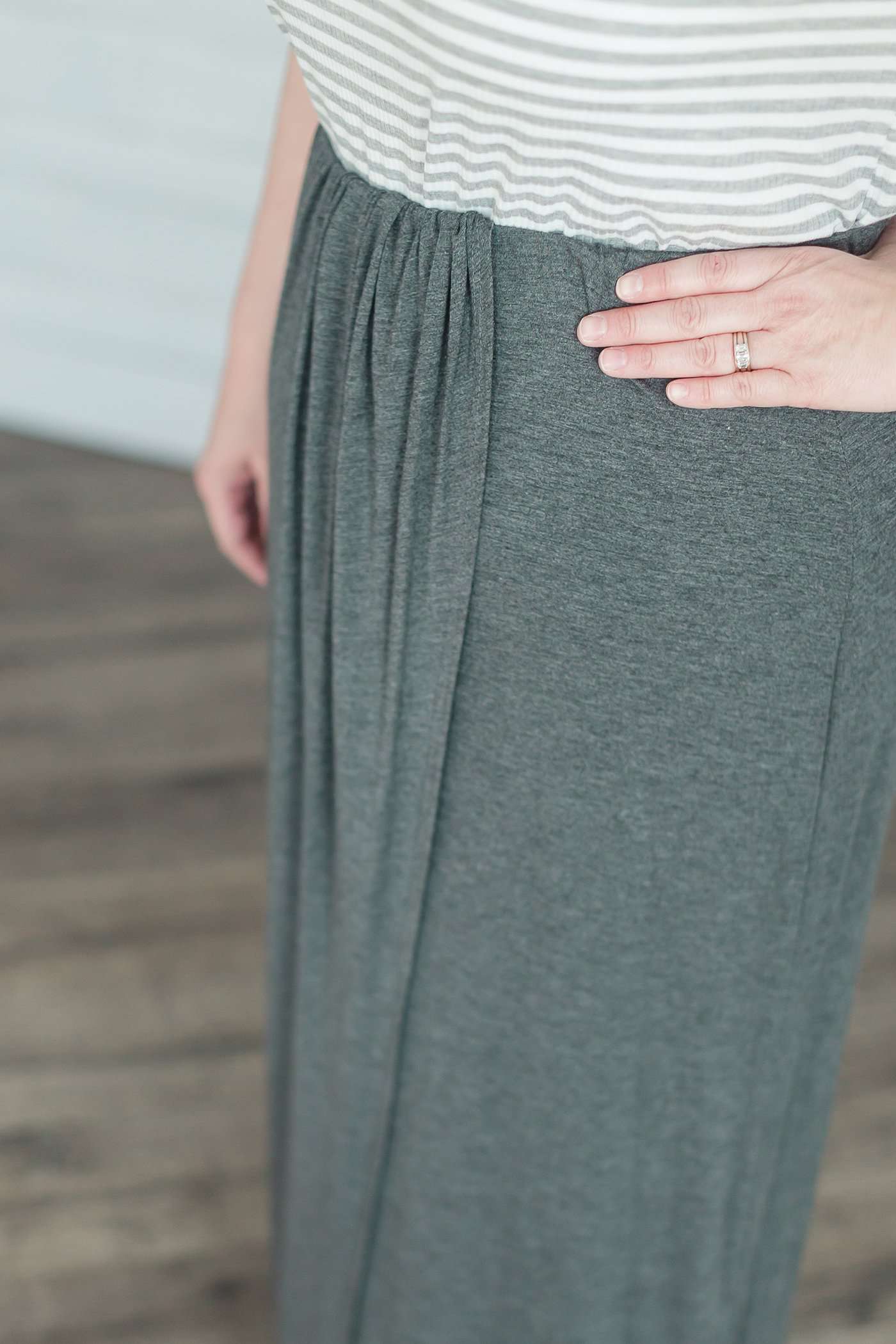 charcoal or black triple pleated maxi skirt with elastic waist.