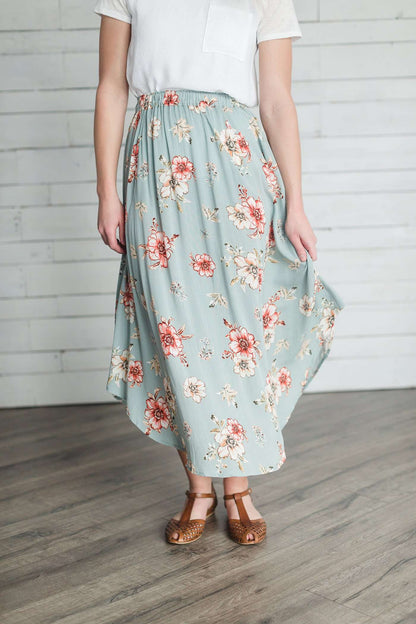 mint floral ankle length skirt with hi to low sides and bottom and elastic waistband.
