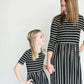 striped modest dress with elastic waist.