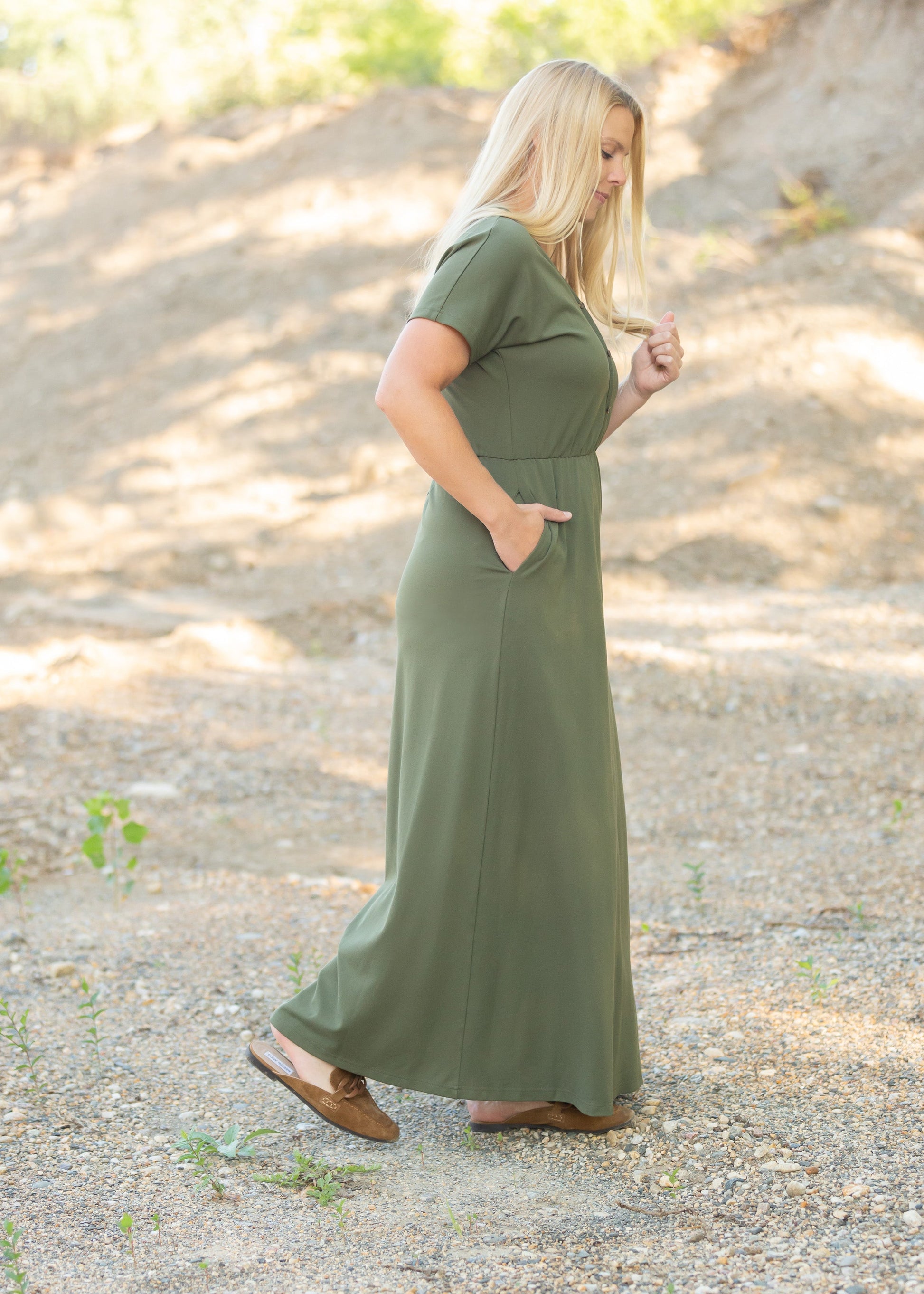 Made from an elevated ponte fabric, the Ella Cinched Waist Maxi Dress is an Inherit Design that will take you from season to season. There are non-functioning tortoise shell buttons down the front to ensure a modest fit. The top of the dress has a dolman fit and drop arms to keep you comfortable and give a flattering fit! The skirt of the dress has a slight a-line making this a super versatile dress that you can feel confident wearing.