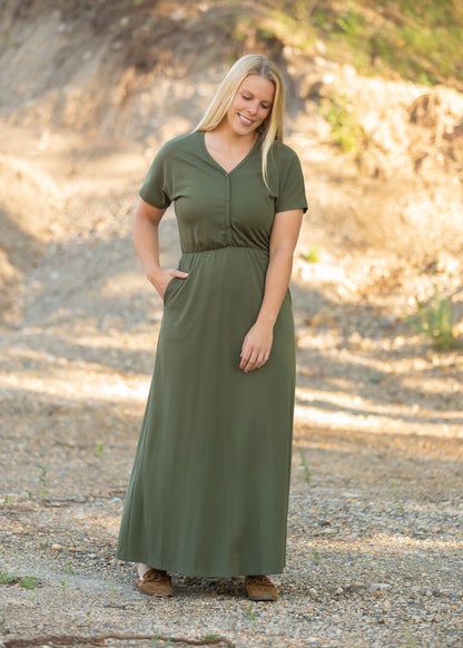 Made from an elevated ponte fabric, the Ella Cinched Waist Maxi Dress is an Inherit Design that will take you from season to season. There are non-functioning tortoise shell buttons down the front to ensure a modest fit. The top of the dress has a dolman fit and drop arms to keep you comfortable and give a flattering fit! The skirt of the dress has a slight a-line making this a super versatile dress that you can feel confident wearing.