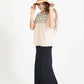 Woman wearing a blush embroidered bohemian style top