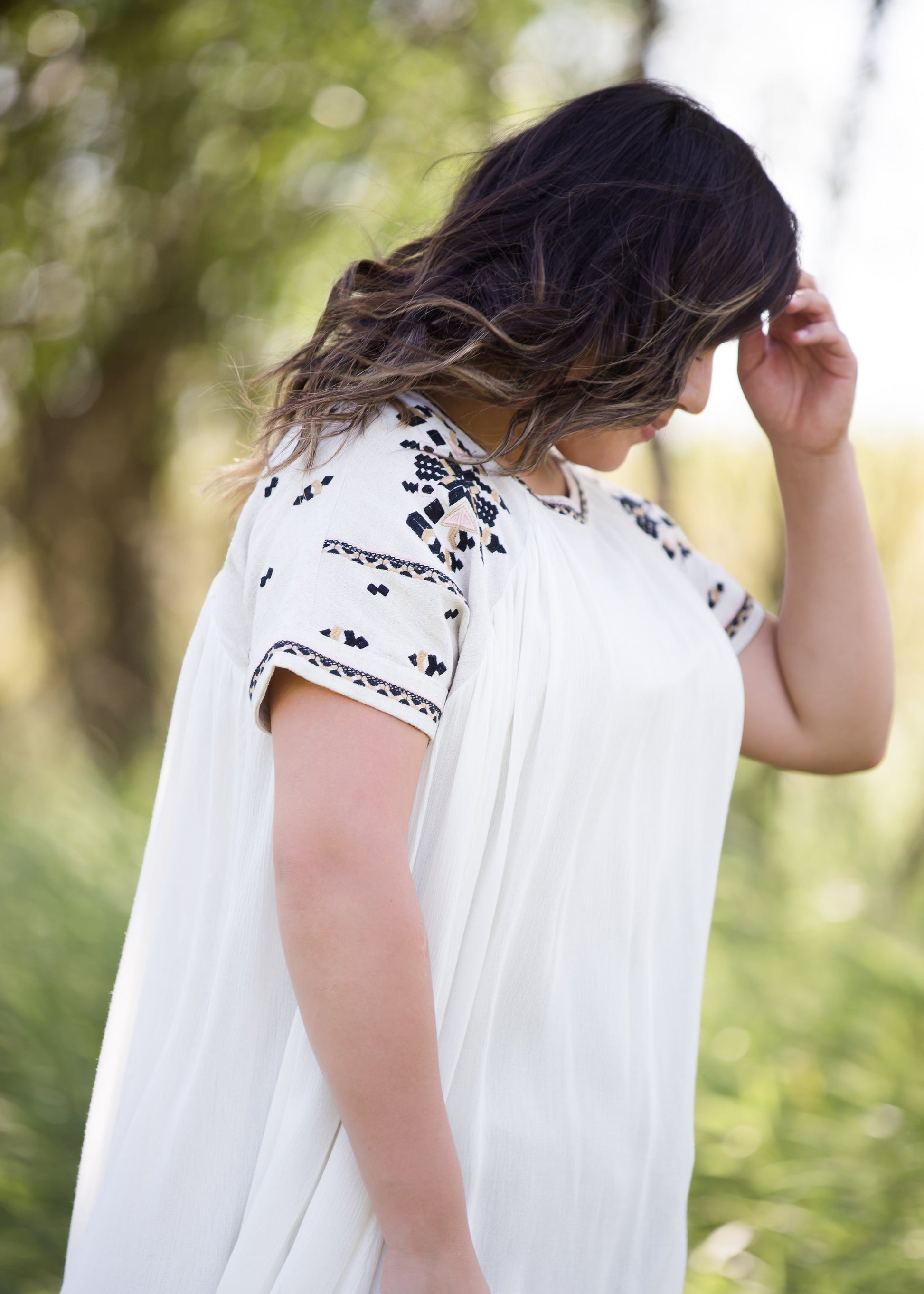 oatmeal colored flowy embroidered midi dress