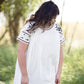 oatmeal colored flowy embroidered midi dress
