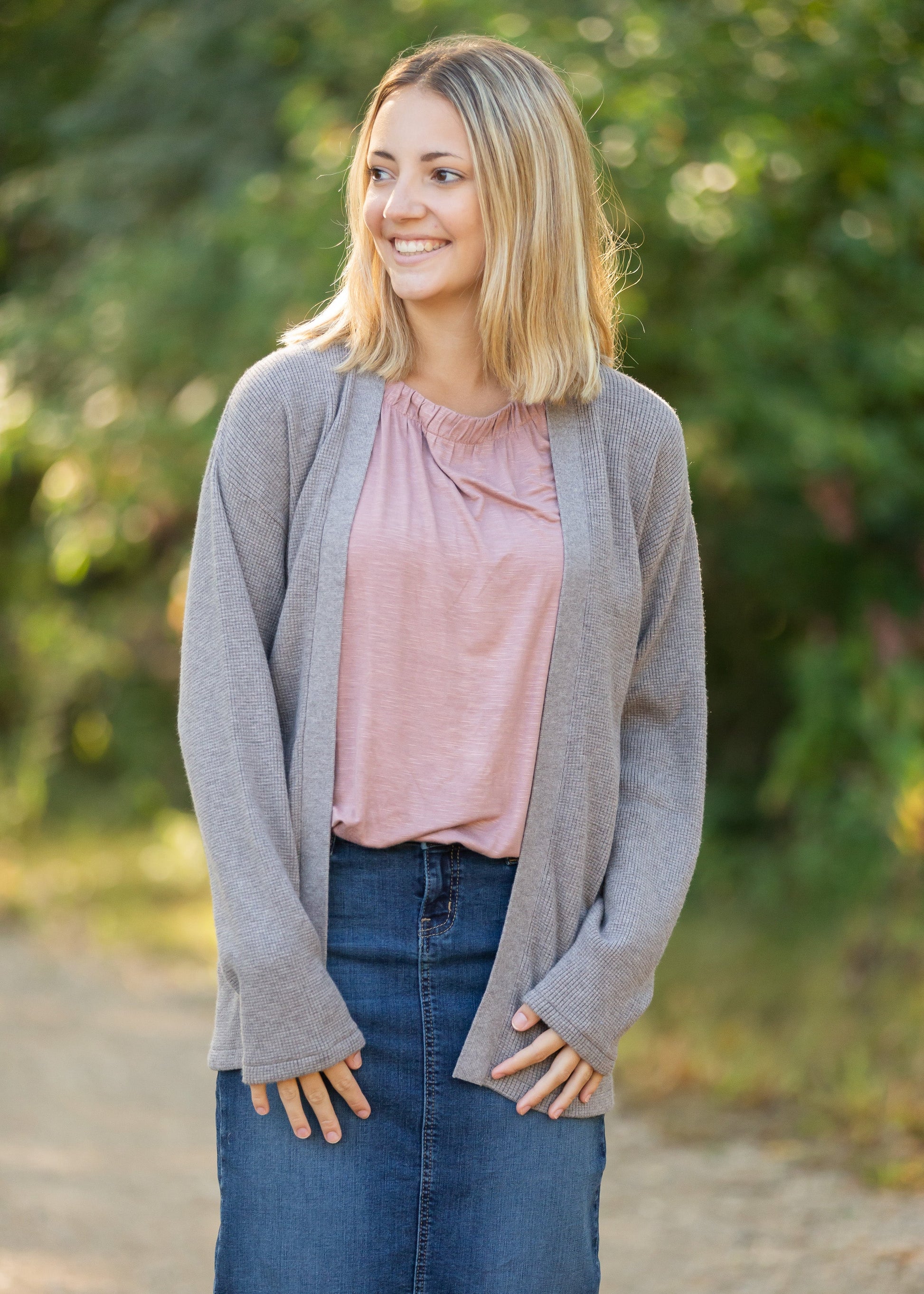 This high quality waffle knit cardigan hits right at the hip and is an elevated essential.