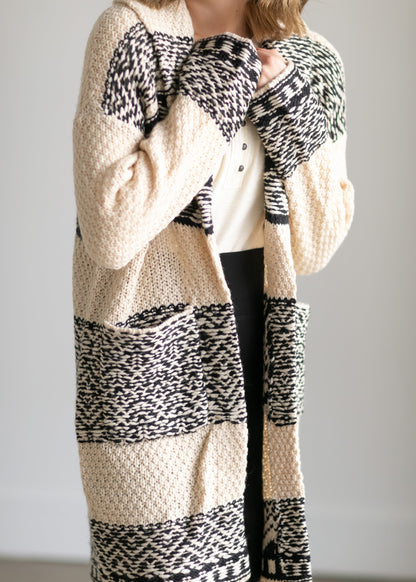 The Fair Isle Open Front Coatigan by Lucky Brand is the perfect indoor/outdoor layer! These open front cardigans have a thick knit pattern in black + tan or gray + white. Designed with a shawl collar, and large front pockets! They can be worn as a coat or a cardigan and have an open front style that will look great with all the things!