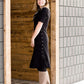 These are cow split suede tall riding boots. The have a stacked heel and feature a size zip on the 16" shaft of the riding boot. These boots are being word with a modest midi dress!