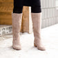 These are cow split suede tall riding boots. The have a stacked heel and feature a size zip on the 16" shaft of the riding boot. These boots are being word with a modest midi dress!