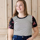 black white and pink floral sleeve and stripe front top