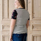 black white and pink floral sleeve and stripe front top