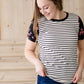 black white and pink floral sleeve and stripe front top