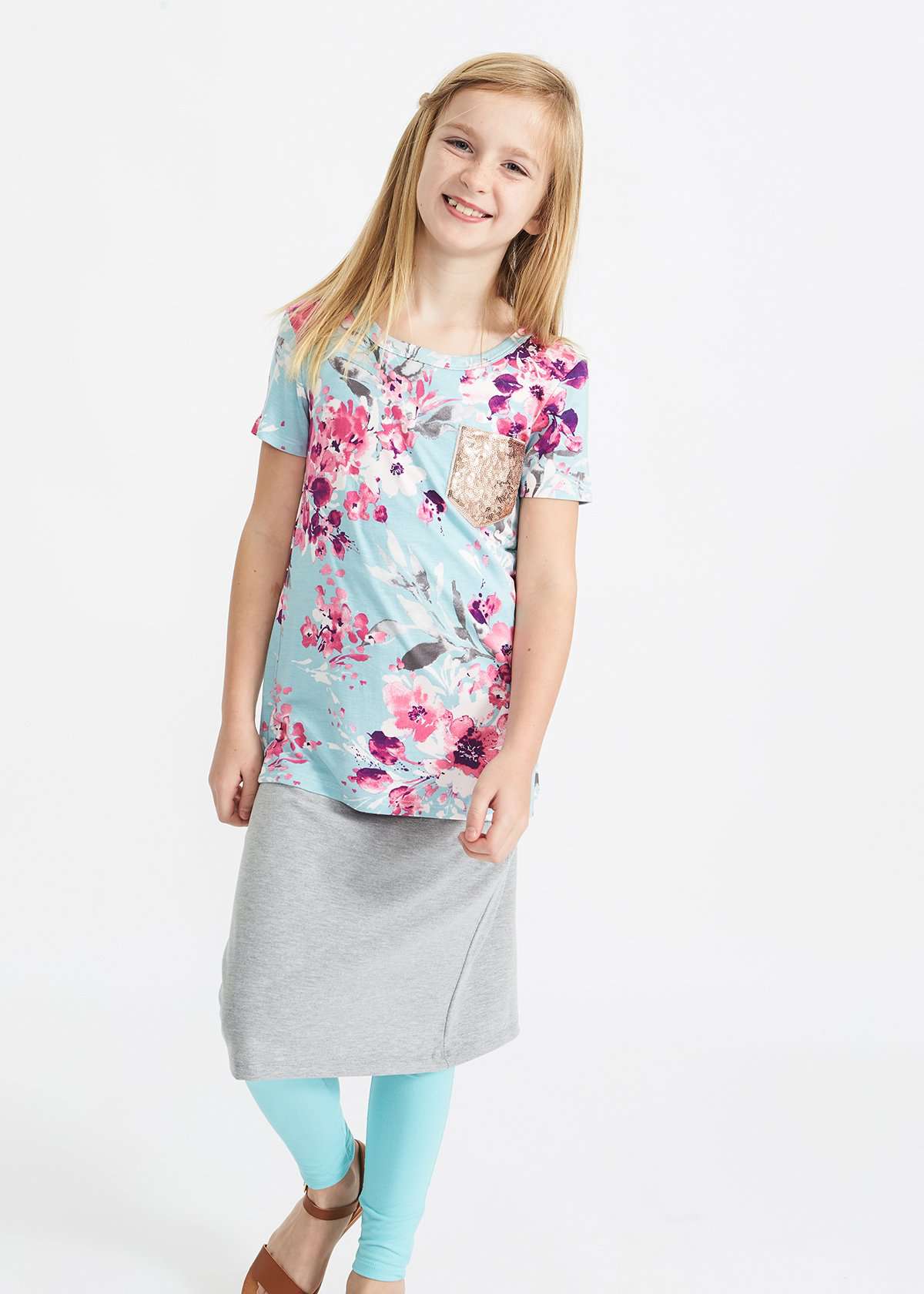pink and purple florals on a blue girls tee shirt with a rose gold sequin pocket