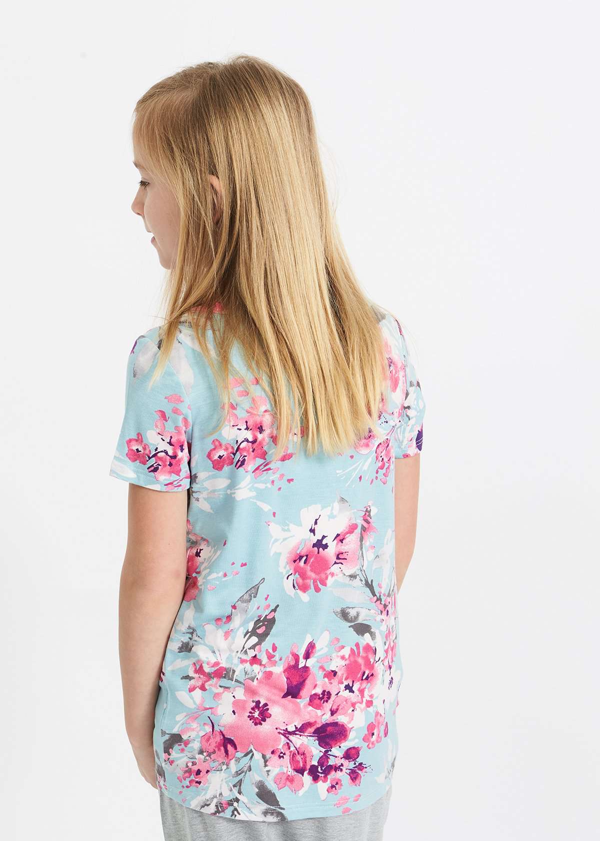 pink and purple florals on a blue girls tee shirt with a rose gold sequin pocket