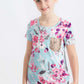 pink and purple florals on a blue girls tee shirt with a rose gold sequin pocket