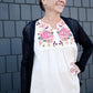 Floral embroidered smocked white top