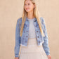 Frayed Light Wash Denim Jean Jacket with brass front buttons, a classic collar and a frayed hem.