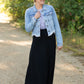 Frayed Light Wash Denim Jean Jacket with brass front buttons, a classic collar and a frayed hem.