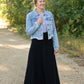 Frayed Light Wash Denim Jean Jacket with brass front buttons, a classic collar and a frayed hem.